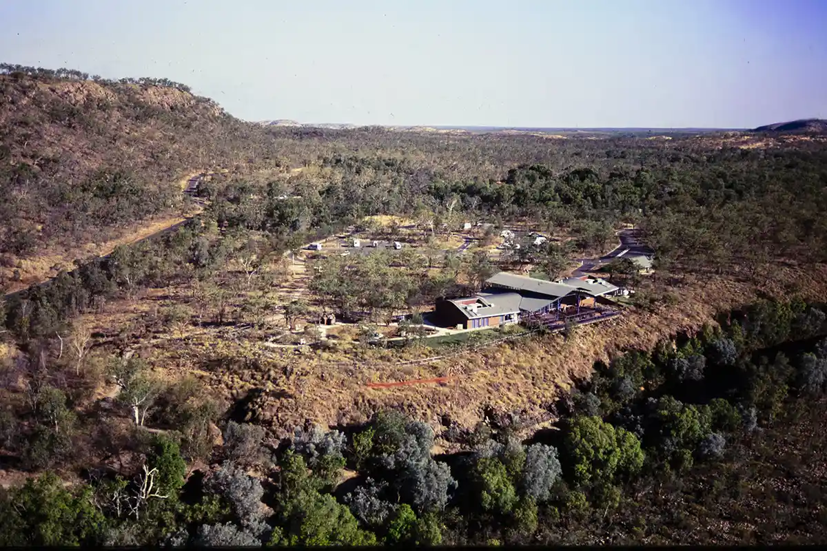 Aerial view of the Visitor Centre of Nitmiluk National Park near Katherine NT. Katherine River in the foreground, escarpment behind.