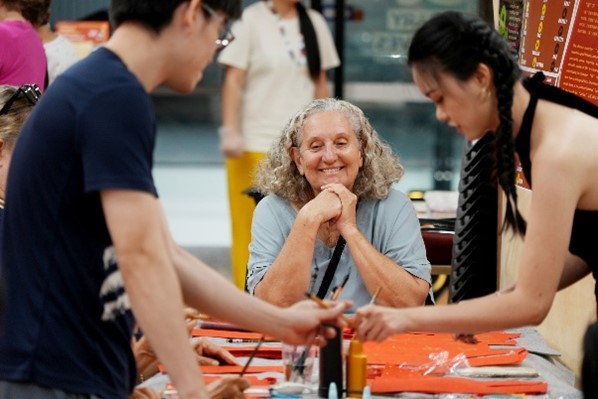 CDU Confucius Institute teacher demonstrates calligraphy.
